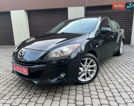Чорний Мазда 3, об'ємом двигуна 1.6 л та пробігом 145 тис. км за 7599 $, фото 1 на Automoto.ua