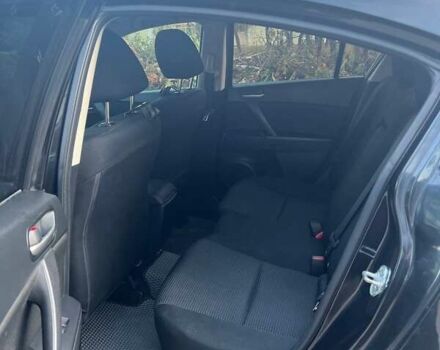 Черный Мазда 3, объемом двигателя 2 л и пробегом 160 тыс. км за 5900 $, фото 1 на Automoto.ua