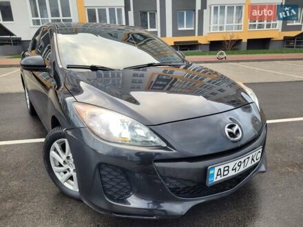 Черный Мазда 3, объемом двигателя 2 л и пробегом 160 тыс. км за 5999 $, фото 1 на Automoto.ua