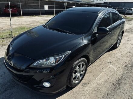 Черный Мазда 3, объемом двигателя 2 л и пробегом 174 тыс. км за 6500 $, фото 1 на Automoto.ua