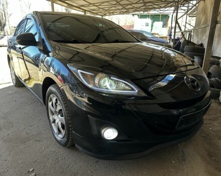 Черный Мазда 3, объемом двигателя 2 л и пробегом 174 тыс. км за 6500 $, фото 1 на Automoto.ua