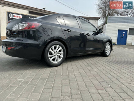 Черный Мазда 3, объемом двигателя 2 л и пробегом 245 тыс. км за 5400 $, фото 1 на Automoto.ua