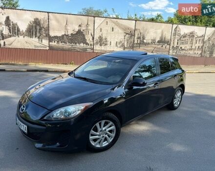 Черный Мазда 3, объемом двигателя 2 л и пробегом 275 тыс. км за 6900 $, фото 1 на Automoto.ua