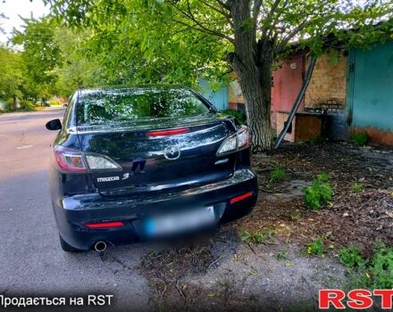 Черный Мазда 3, объемом двигателя 2 л и пробегом 225 тыс. км за 6900 $, фото 1 на Automoto.ua