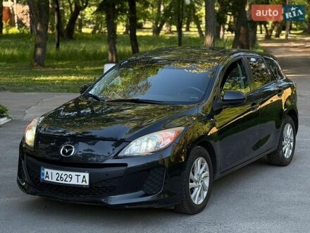 Черный Мазда 3, объемом двигателя 2 л и пробегом 275 тыс. км за 7500 $, фото 1 на Automoto.ua