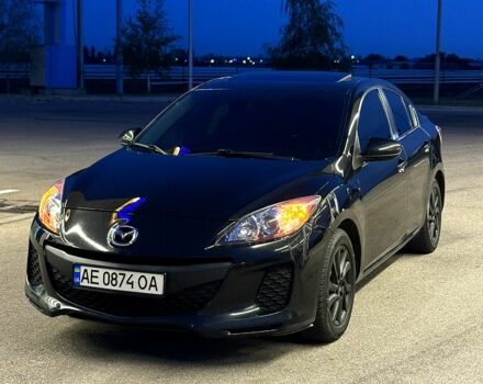 Черный Мазда 3, объемом двигателя 2 л и пробегом 140 тыс. км за 7700 $, фото 1 на Automoto.ua
