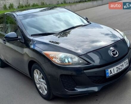 Черный Мазда 3, объемом двигателя 2 л и пробегом 274 тыс. км за 7300 $, фото 1 на Automoto.ua