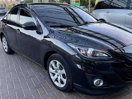 Черный Мазда 3, объемом двигателя 2 л и пробегом 178 тыс. км за 6300 $, фото 1 на Automoto.ua