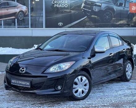 Черный Мазда 3, объемом двигателя 2 л и пробегом 270 тыс. км за 7512 $, фото 1 на Automoto.ua