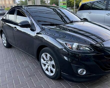 Черный Мазда 3, объемом двигателя 2 л и пробегом 178 тыс. км за 6300 $, фото 1 на Automoto.ua