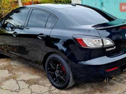 Черный Мазда 3, объемом двигателя 2 л и пробегом 189 тыс. км за 7700 $, фото 1 на Automoto.ua