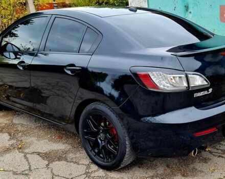 Черный Мазда 3, объемом двигателя 2 л и пробегом 189 тыс. км за 7700 $, фото 1 на Automoto.ua