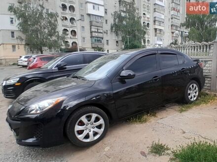 Черный Мазда 3, объемом двигателя 2 л и пробегом 105 тыс. км за 7500 $, фото 1 на Automoto.ua