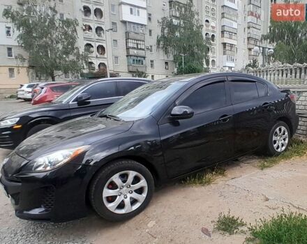 Черный Мазда 3, объемом двигателя 2 л и пробегом 105 тыс. км за 7500 $, фото 1 на Automoto.ua