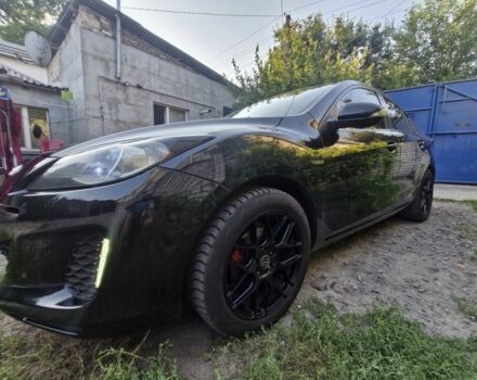 Черный Мазда 3, объемом двигателя 2 л и пробегом 119 тыс. км за 8000 $, фото 1 на Automoto.ua