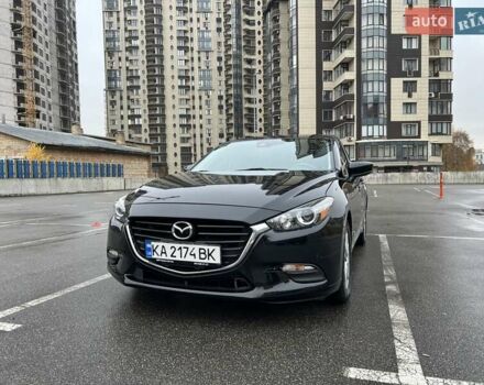 Черный Мазда 3, объемом двигателя 2 л и пробегом 122 тыс. км за 12000 $, фото 1 на Automoto.ua