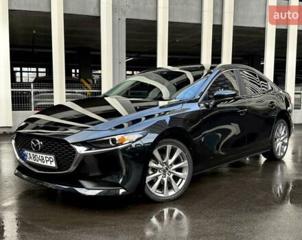 Черный Мазда 3, объемом двигателя 2.49 л и пробегом 65 тыс. км за 15990 $, фото 1 на Automoto.ua