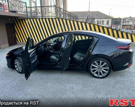 Черный Мазда 3, объемом двигателя 2.5 л и пробегом 290 тыс. км за 19500 $, фото 1 на Automoto.ua