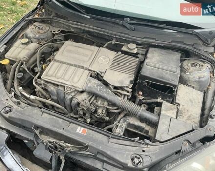 Фиолетовый Мазда 3, объемом двигателя 1.6 л и пробегом 124 тыс. км за 4900 $, фото 31 на Automoto.ua