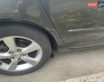 Фиолетовый Мазда 3, объемом двигателя 1.6 л и пробегом 124 тыс. км за 4900 $, фото 9 на Automoto.ua