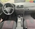 Фиолетовый Мазда 3, объемом двигателя 1.6 л и пробегом 124 тыс. км за 4900 $, фото 26 на Automoto.ua