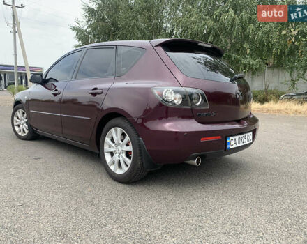 Мазда 3 2007 в Черкассах на Automoto.ua Фиолетовый Мазда 3, объемом двигателя 2 л и пробегом 174 тыс. км за 6450 $, фото 6 на Automoto.ua