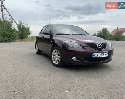 Мазда 3 2007 в Черкассах на Automoto.ua Фиолетовый Мазда 3, объемом двигателя 2 л и пробегом 174 тыс. км за 6450 $, фото 2 на Automoto.ua