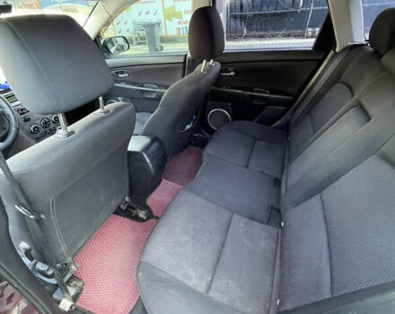 Фиолетовый Мазда 3, объемом двигателя 1.6 л и пробегом 270 тыс. км за 6250 $, фото 18 на Automoto.ua