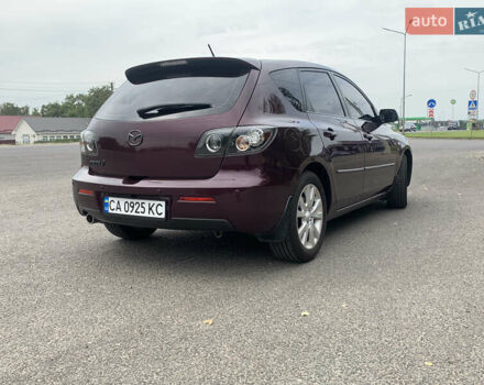 Мазда 3 2007 в Черкассах на Automoto.ua Фиолетовый Мазда 3, объемом двигателя 2 л и пробегом 174 тыс. км за 6450 $, фото 4 на Automoto.ua