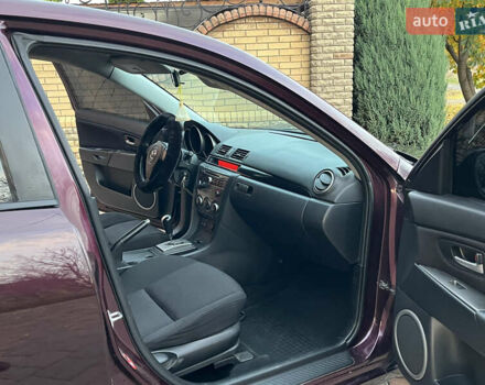 Мазда 3 2007 в Смеле на Automoto.ua Фиолетовый Мазда 3, объемом двигателя 1.6 л и пробегом 250 тыс. км за 4250 $, фото 25 на Automoto.ua