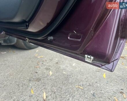 Фиолетовый Мазда 3, объемом двигателя 1.6 л и пробегом 211 тыс. км за 3750 $, фото 41 на Automoto.ua