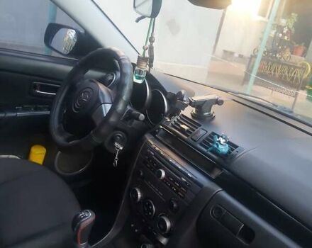 Фиолетовый Мазда 3, объемом двигателя 1.6 л и пробегом 210 тыс. км за 5500 $, фото 6 на Automoto.ua