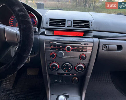 Мазда 3 2007 в Смеле на Automoto.ua Фиолетовый Мазда 3, объемом двигателя 1.6 л и пробегом 250 тыс. км за 4250 $, фото 31 на Automoto.ua