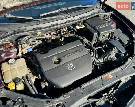 Фиолетовый Мазда 3, объемом двигателя 2 л и пробегом 248 тыс. км за 5100 $, фото 7 на Automoto.ua