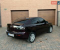Мазда 3 2007 в Смеле на Automoto.ua Фиолетовый Мазда 3, объемом двигателя 1.6 л и пробегом 250 тыс. км за 4250 $, фото 23 на Automoto.ua