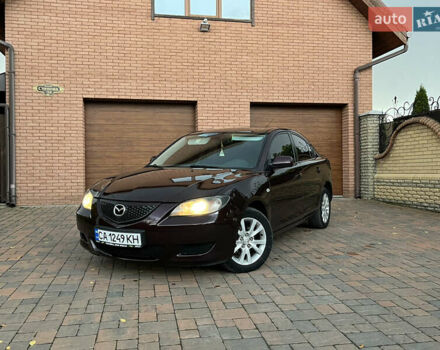 Мазда 3 2007 в Смеле на Automoto.ua Фиолетовый Мазда 3, объемом двигателя 1.6 л и пробегом 250 тыс. км за 4250 $, фото 3 на Automoto.ua
