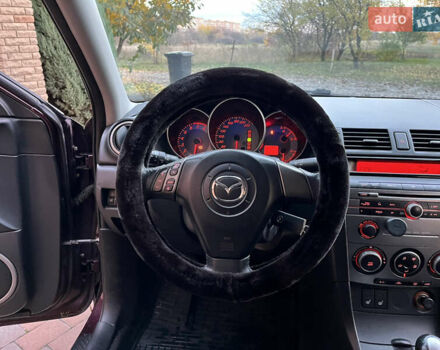 Мазда 3 2007 в Смеле на Automoto.ua Фиолетовый Мазда 3, объемом двигателя 1.6 л и пробегом 250 тыс. км за 4250 $, фото 28 на Automoto.ua