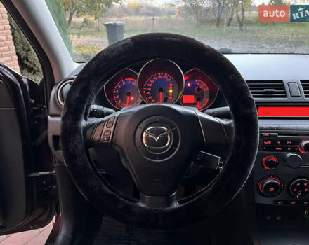 Мазда 3 2007 в Смеле на Automoto.ua Фиолетовый Мазда 3, объемом двигателя 1.6 л и пробегом 250 тыс. км за 4250 $, фото 30 на Automoto.ua
