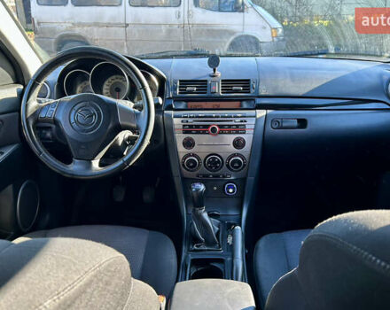 Фиолетовый Мазда 3, объемом двигателя 2 л и пробегом 248 тыс. км за 5100 $, фото 9 на Automoto.ua