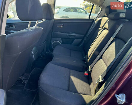 Фиолетовый Мазда 3, объемом двигателя 2 л и пробегом 248 тыс. км за 5100 $, фото 10 на Automoto.ua