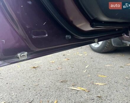 Фиолетовый Мазда 3, объемом двигателя 1.6 л и пробегом 211 тыс. км за 3750 $, фото 45 на Automoto.ua