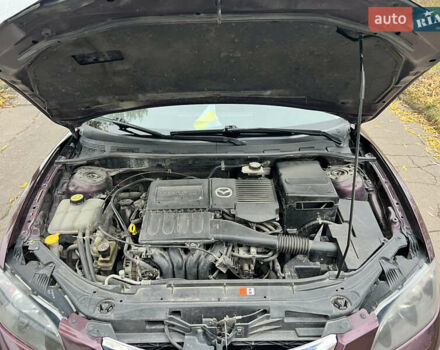 Фиолетовый Мазда 3, объемом двигателя 1.6 л и пробегом 211 тыс. км за 3750 $, фото 38 на Automoto.ua