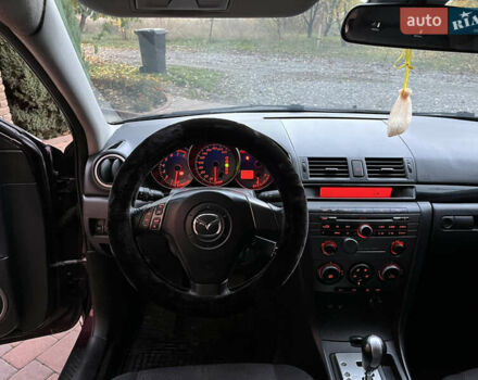 Мазда 3 2007 в Смеле на Automoto.ua Фиолетовый Мазда 3, объемом двигателя 1.6 л и пробегом 250 тыс. км за 4250 $, фото 29 на Automoto.ua