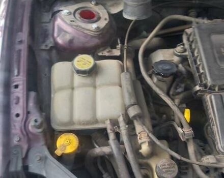 Фиолетовый Мазда 3, объемом двигателя 1.6 л и пробегом 210 тыс. км за 5500 $, фото 9 на Automoto.ua