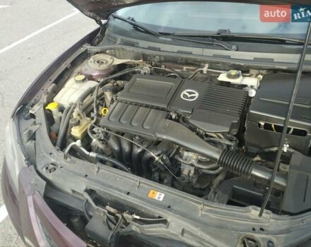 Фиолетовый Мазда 3, объемом двигателя 1.6 л и пробегом 155 тыс. км за 5800 $, фото 4 на Automoto.ua