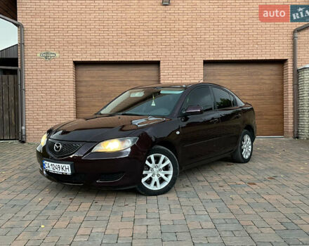 Мазда 3 2007 в Смеле на Automoto.ua Фиолетовый Мазда 3, объемом двигателя 1.6 л и пробегом 250 тыс. км за 4250 $, фото 9 на Automoto.ua