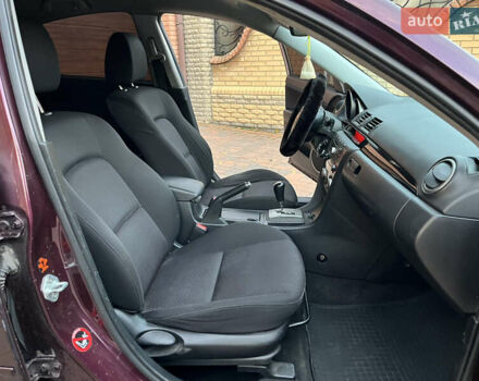 Мазда 3 2007 в Смеле на Automoto.ua Фиолетовый Мазда 3, объемом двигателя 1.6 л и пробегом 250 тыс. км за 4250 $, фото 26 на Automoto.ua