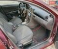 Фіолетовий Мазда 3, об'ємом двигуна 1.6 л та пробігом 216 тис. км за 3200 $, фото 27 на Automoto.ua