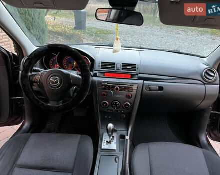 Мазда 3 2007 в Смеле на Automoto.ua Фиолетовый Мазда 3, объемом двигателя 1.6 л и пробегом 250 тыс. км за 4250 $, фото 27 на Automoto.ua