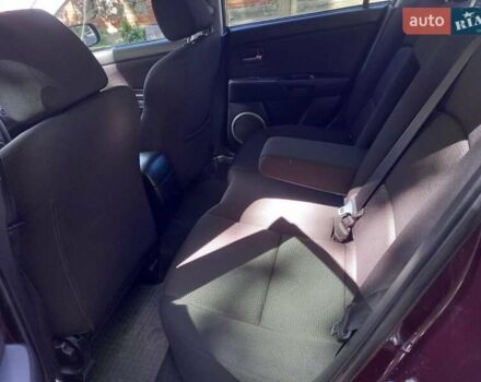 Мазда 3 2008 в Киеве на Automoto.ua Фиолетовый Мазда 3, объемом двигателя 1.6 л и пробегом 178 тыс. км за 5900 $, фото 8 на Automoto.ua